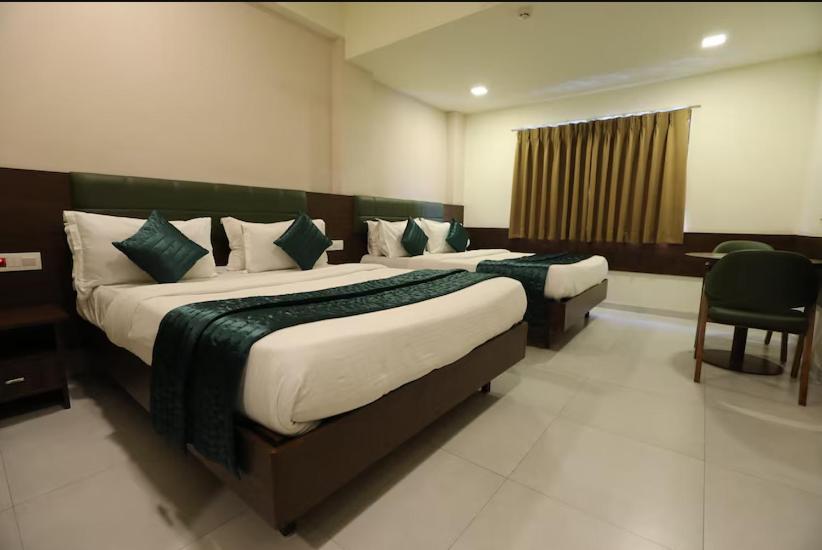 Greenotel Rooms Hazira, Surat Exteriör bild
