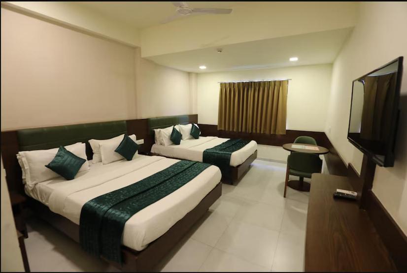 Greenotel Rooms Hazira, Surat Exteriör bild